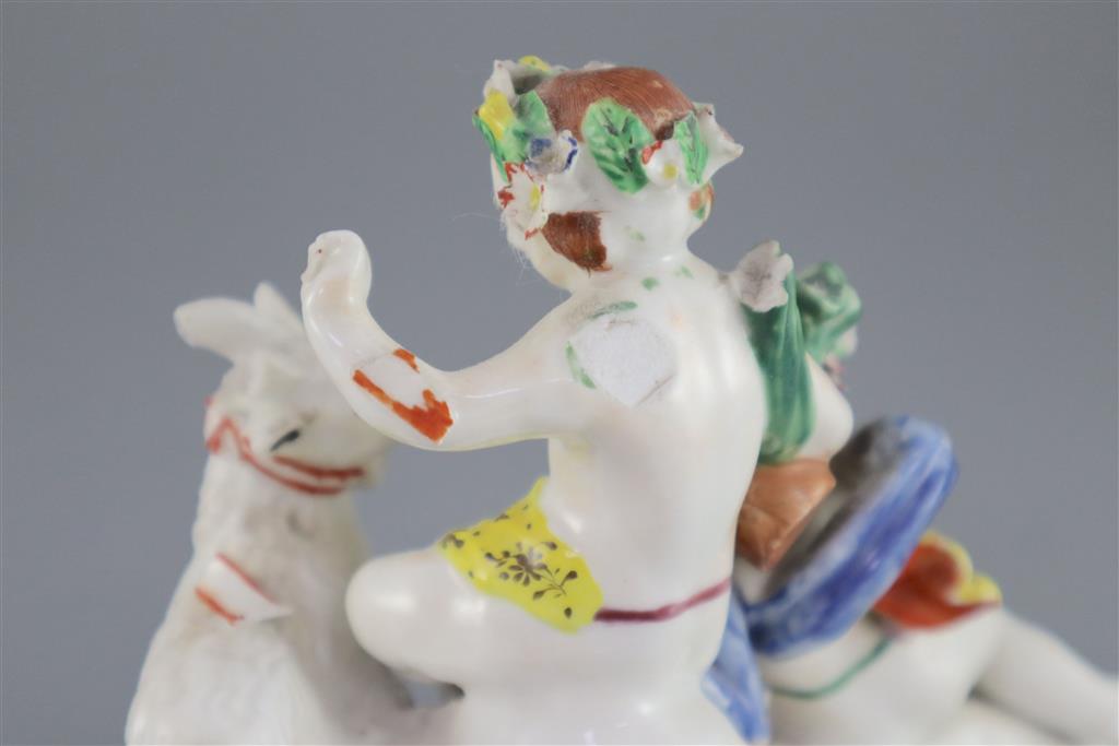 A Vauxhall porcelain group of two Bacchanalian cherubs and a goat, c.1760-5, 14.5cm high